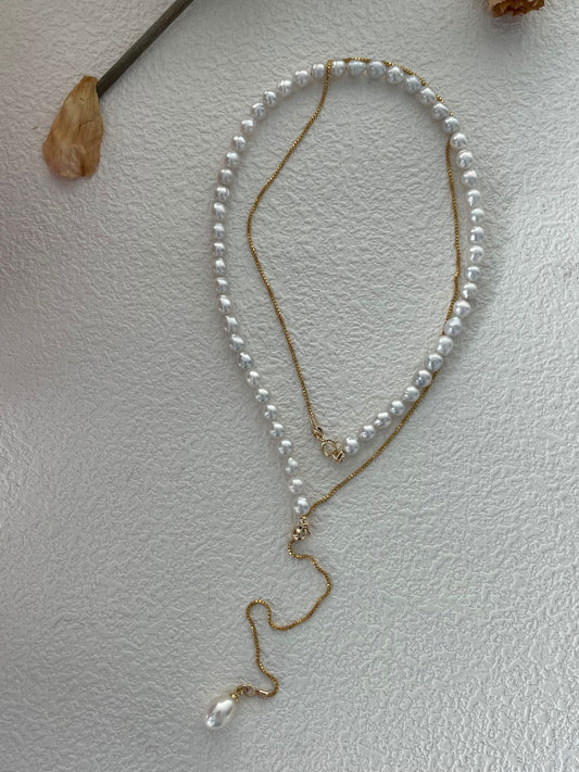 Lumine Pearl U-Shaped Long Necklace