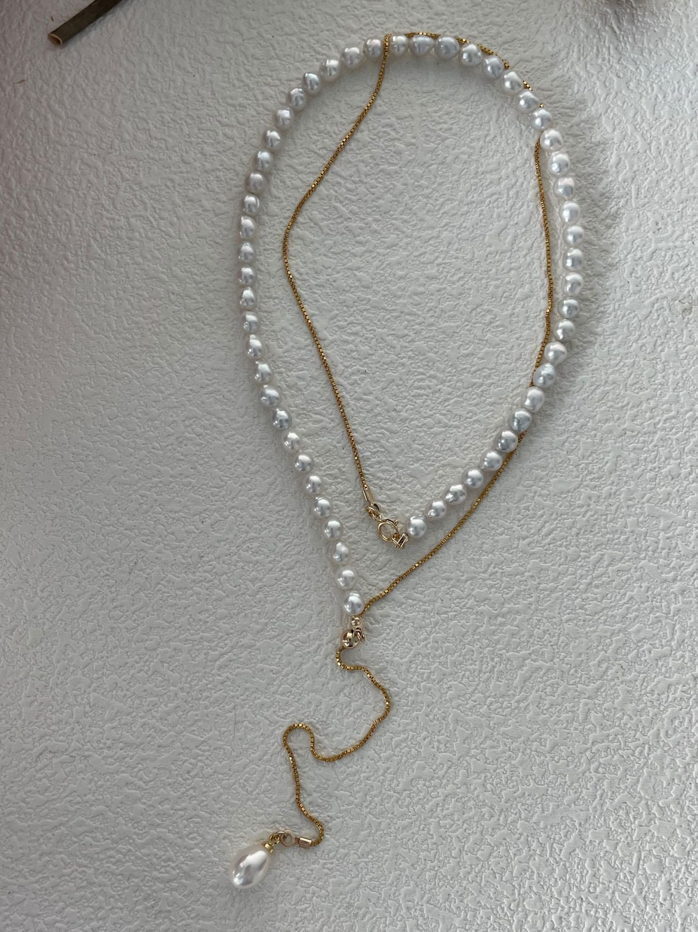 Lumine Pearl U-Shaped Long Necklace