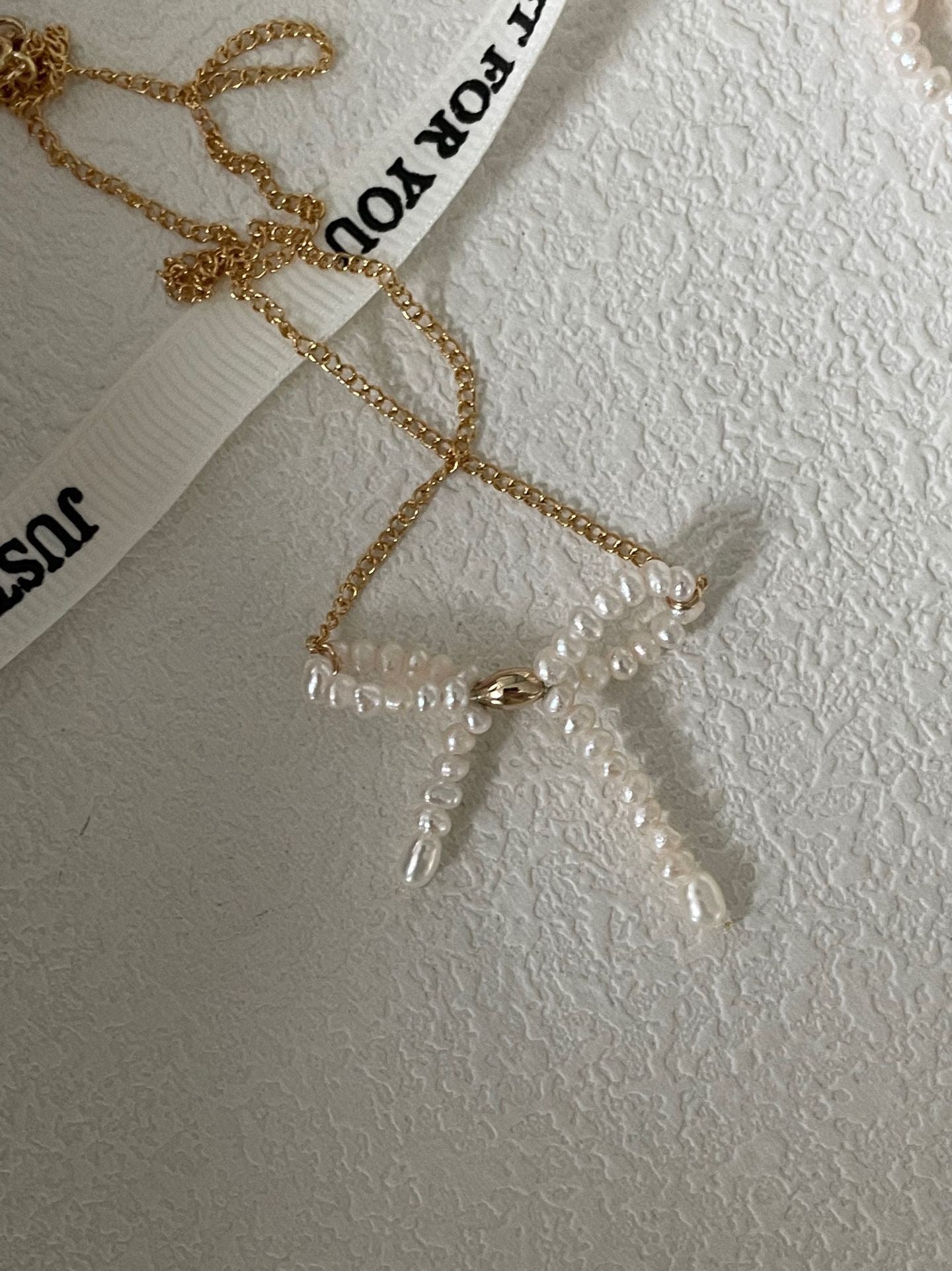 Butterfly Knot Pearl Necklace