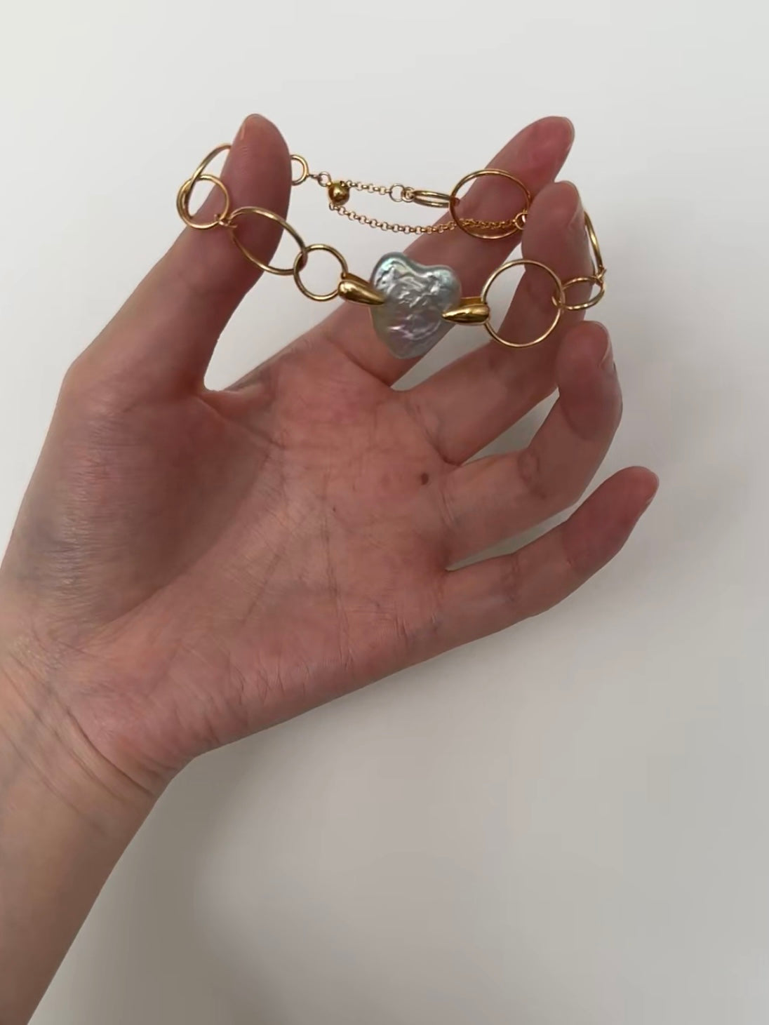 Golden Orbit Heart Bracelet