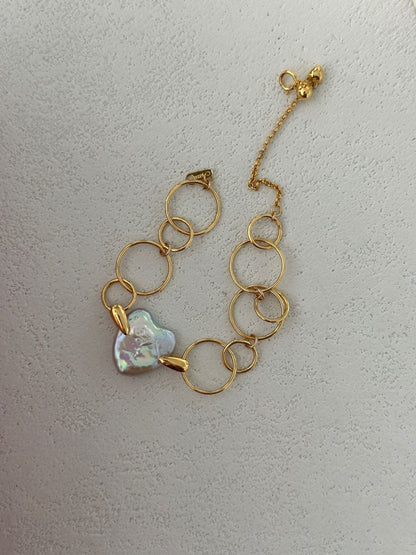 Golden Orbit Heart Bracelet